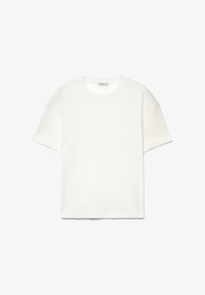 Plain white short-sleeve crew neck T-shirt with a relaxed fit and visible label inside the collar.