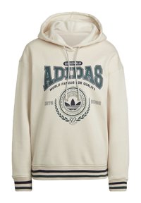 Felpa beige Adidas con logo frontale, "Originals Adidas," "Famoso in tutto il mondo per la qualità," 1972-2022, e emblema dei 50 anni, polsini e orlo a strisce.