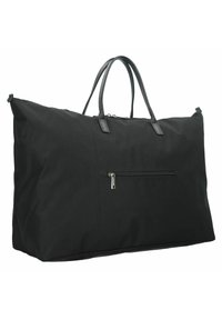 Sac tote en tissu noir avec des poignées en cuir, de forme rectangulaire, et une poche zippée à l'avant. Texture lisse, design léger, adapté pour les voyages.