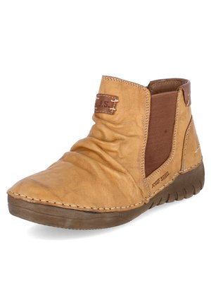 Braune Lederknöchelstiefel mit elastischen Seiteneinsätzen, gewellter Textur, runder Zehenpartie und Gummisohle. Mit genähten Details und Logo.