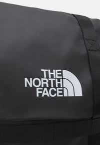 The North Face COMMUTER PACK ROLL TOP UNISEX - Turistinė kuprinė - black
