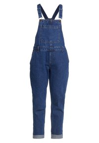 Rikkiharmaat farkkuhaalarit, joissa on säädettävät olkaimet, rintatasku, sivutaskut, vyölenkit ja käärityt lahkeensuutsit.