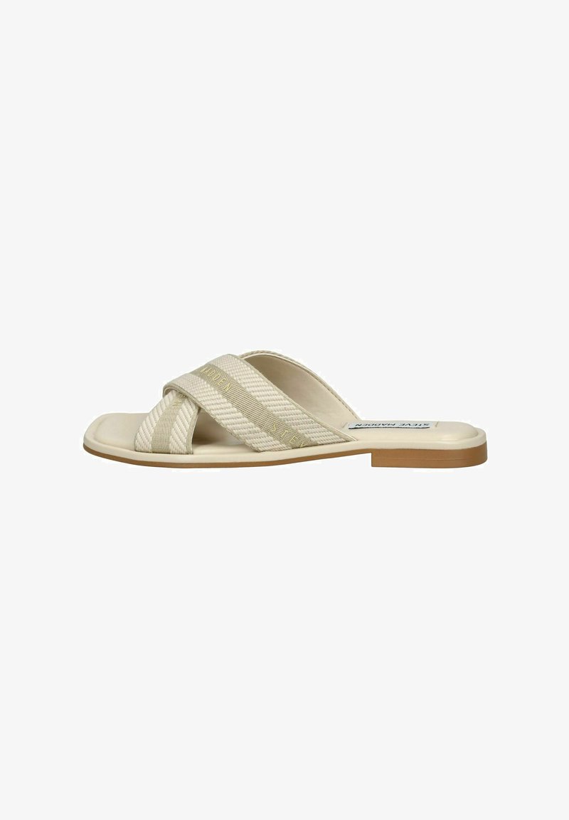 Sandalini beige senza chiusura con cinturini intrecciati e testurizzati; suola piatta con accenti marrone chiaro; design minimalista senza decorazioni.