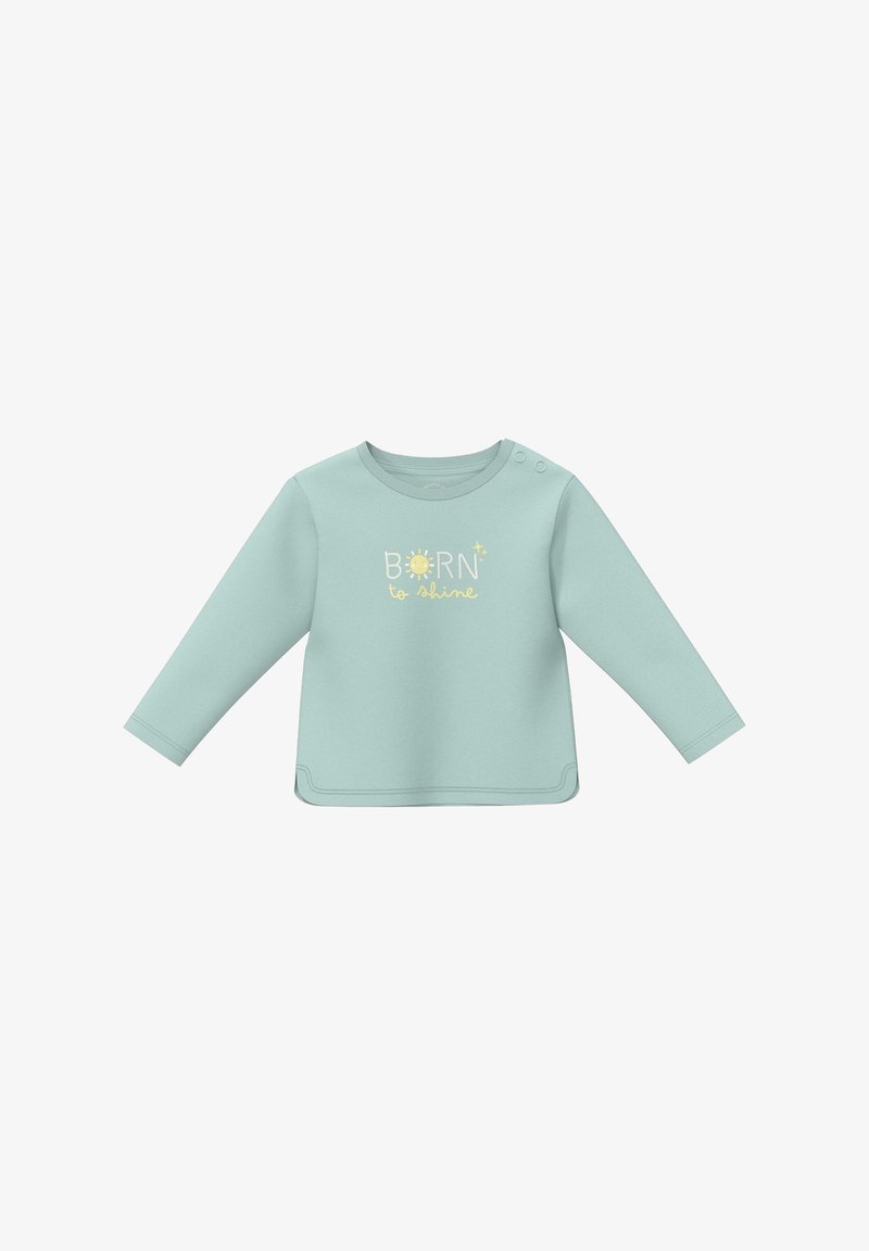 Chemise bébé à manches longues bleu clair avec des boutons pression aux épaules, arborant le texte « Né pour briller » et un graphique de soleil au centre devant.