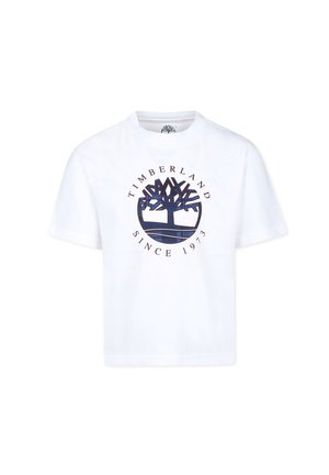 T-shirt en coton blanc avec un col rond, des manches courtes et un logo graphique central représentant un arbre accompagné du texte "TIMBERLAND SINCE 1973" en bleu marine.