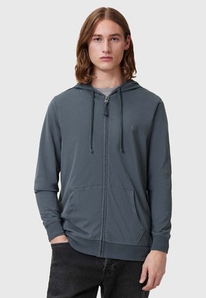 Kapuzensweatshirt mit Reißverschluss in Dunkelgrau, ausgestattet mit Fronttaschen, Kordelzug und dezentem Logo. Weicher, glatter Stoff mit langen Ärmeln.