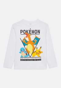 White long-sleeve t-shirt featuring Pokémon characters: Charizard, Squirtle, and Pikachu with text "NOW READY FOR BATTLE GOTTA CATCH 'EM ALL!"