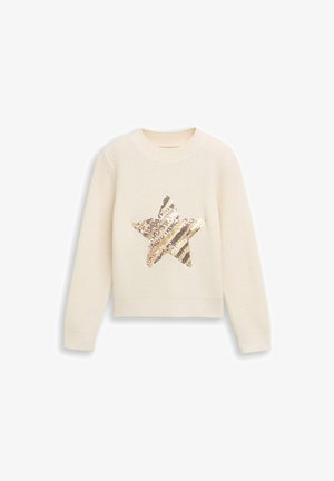Kremowy sweter dziany z dużym, złotym i srebrnym wzorem gwiazdy z cekinów z przodu. Okrągły dekolt i długie rękawy.