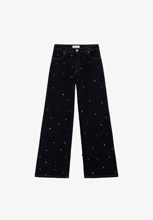 Jeans de mezclilla negra de pierna ancha con adornos multicolores por todo el pantalón. Cuenta con cinco bolsillos y cierre de botón y cremallera.