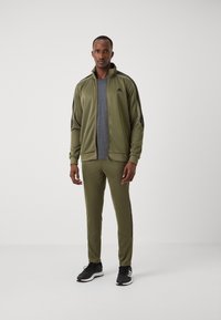 adidas Sportswear TRACKSUIT - Melegítő - olive strata