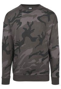 Sudadera camuflaje en tonos grises apagados, con cuello redondo, mangas largas y ribete en el bajo. Fabricada en material de algodón suave.