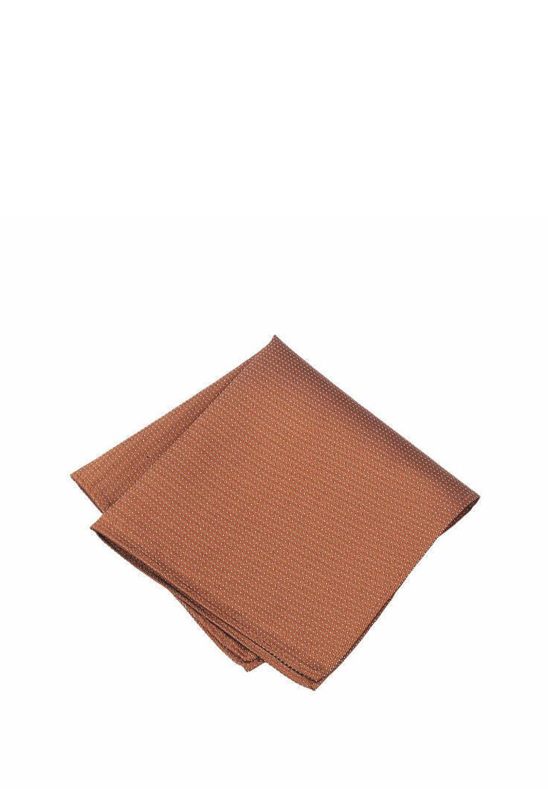 Textured fabric napkin in rust color, featuring a geometric pattern with fine accents. Folded neatly, showcasing the design and material.