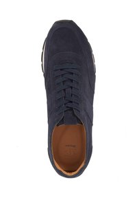 Navy suede sneaker with lace-up design, rubber sole, and tan interior. Features textured upper and minimalistic side accents.