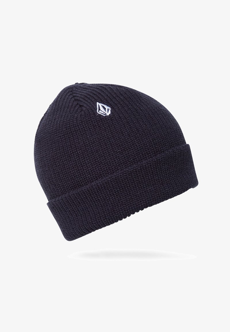 Bonnet en maille bleu marine foncé avec un revers plié et un petit logo géométrique blanc à l'avant.
