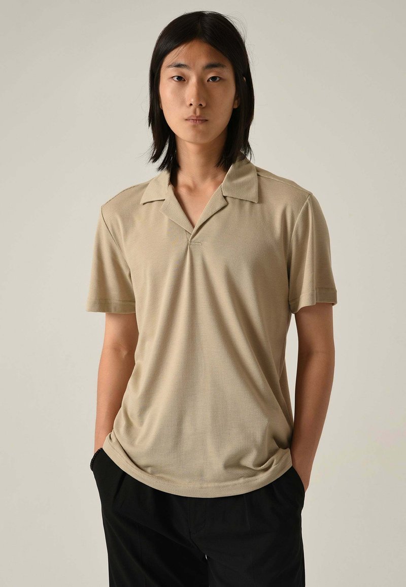 Antioch SHORT SLEEVE Polo shirt beige Zalando