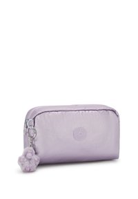 Light purple cosmetic bag with a soft texture, rounded shape, zip closure, and a keychain featuring a fluffy purple monkey charm.