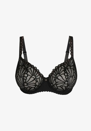 Sujetador de encaje negro con copas de malla transparente que presentan bordado floral, tirantes ajustables y bordes festoneados, complementado por un adorno central.