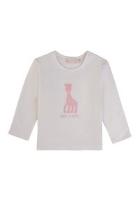 Maglietta bianca a maniche lunghe per bambini con grafica di una giraffa rosa e testo "Sophie La Girafe" sul davanti, bottoni a pressione sulla spalla.