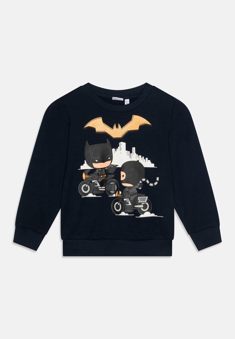 Sweatshirt bleu marine avec un graphique de personnages de dessin animé sur des motos, avec un symbole de chauve-souris jaune au-dessus et une ligne d'horizon de ville en arrière-plan.