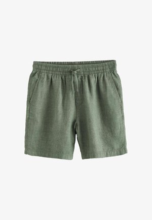 Pantalones cortos verdes de lino con cintura elástica, cordón y bolsillos laterales sobre fondo blanco.