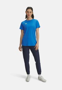 Under Armour CHALLENGER WARMUP - Teplákové kalhoty - washed navy