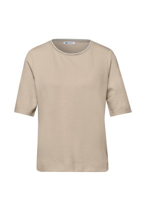 Beigenvärinen, lyhythihainen, pyöreäkauluksinen paita, jossa suora helma ja pieni valkoinen merkkilappu kaula-aukon sisäpuolella.