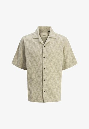 Gaišzaļš un bēšs žakarda raksts īsām piedurknēm, ar galu apkakli un pieciem tumšiem pogām priekšpusē.