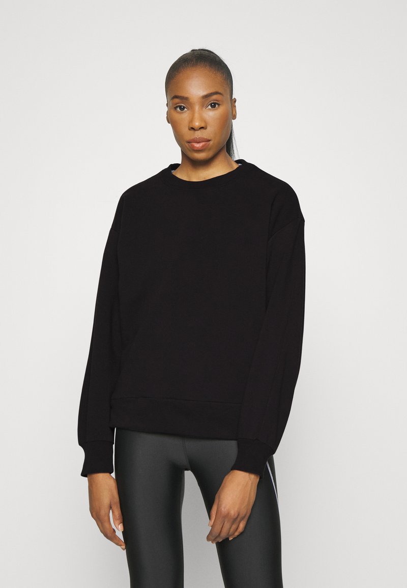 Athleta CREWNECK Sweater black/zwart Zalando.nl
