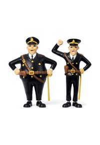 Zwei Plastik-Polizistenfiguren, die schwarze Uniformen mit gelben Akzenten tragen und Schlagstöcke halten. Einer steht mit den Händen in den Hüften, der andere hebt eine Faust.