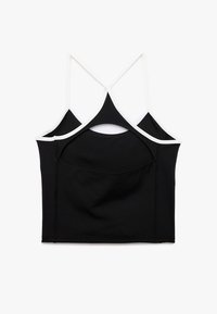 Musta crop-top valkoisella reunuksella, jossa on ristikkäiset spagettiolkapäät ja leikkaus yksityiskohta takana.