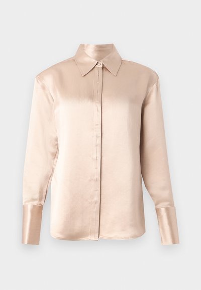 Satin blouse in soft beige with a classic collar, long sleeves, button-up front, and slightly oversized fit. Smooth texture, minimal detailing.