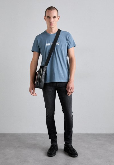 Tiger of Sweden EVOLVE - Slim fit jeans - black