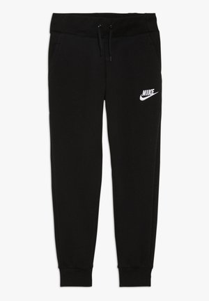 Czarne spodnie dresowe Nike z elastycznym paskiem, sznurkiem, kieszeniami po bokach, mankietami przy kostkach oraz białym logo Nike na lewej udzie.