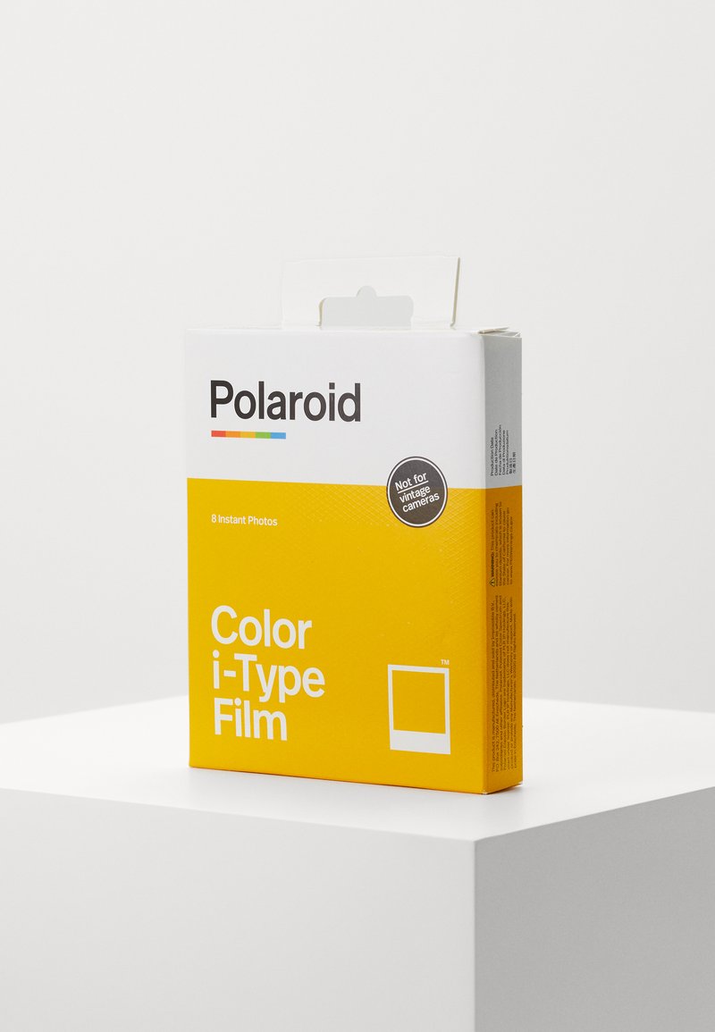 Polaroid Color i-Type Film packaging, featuring a bright yellow base, black text, and a circular label stating "Not for vintage cameras."