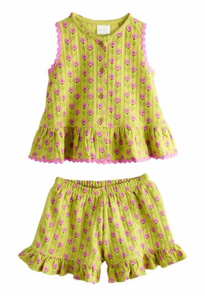 Sleeveless yellow-green top and shorts set with pink floral pattern and ruffled edges, featuring front buttons on the top.