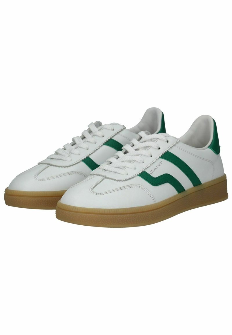 Białe skórzane sneakersy z zielonymi paskami, sznurowana konstrukcja i podeszwy z gumy. Posiadają wyściełany kołnierz i przeszycia.