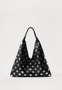 Black leather bag with a triangular shape, featuring silver metallic polka dots and a textured handle. Smooth finish overall.