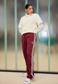 adidas Originals ADICOLOR CLASSICS FIREBIRD PRIME - Tracksuit bottoms - shadow red