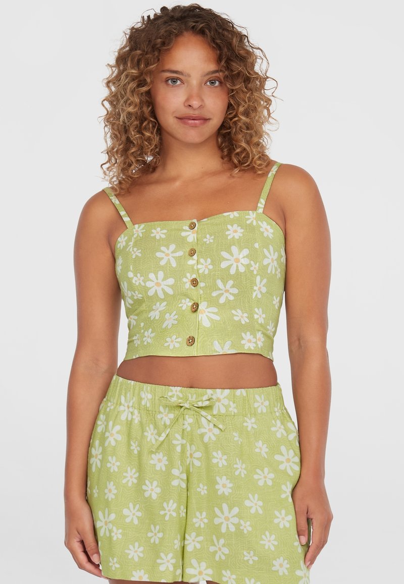 Svetlozelený crop top s bielymi kvetinovými vzormi, s nastaviteľnými ramienkami a gombíkovým zapínaním. Spárovaný s kvetinovými šortkami v rovnakom štýle.