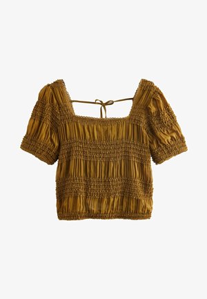 Musztardowa, krótka bluzka z krótkimi bufkami, o marszczonym wykończeniu, kwadratowym dekolcie i wiązaniu na plecach.