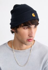 Unselected, dark navy/gold