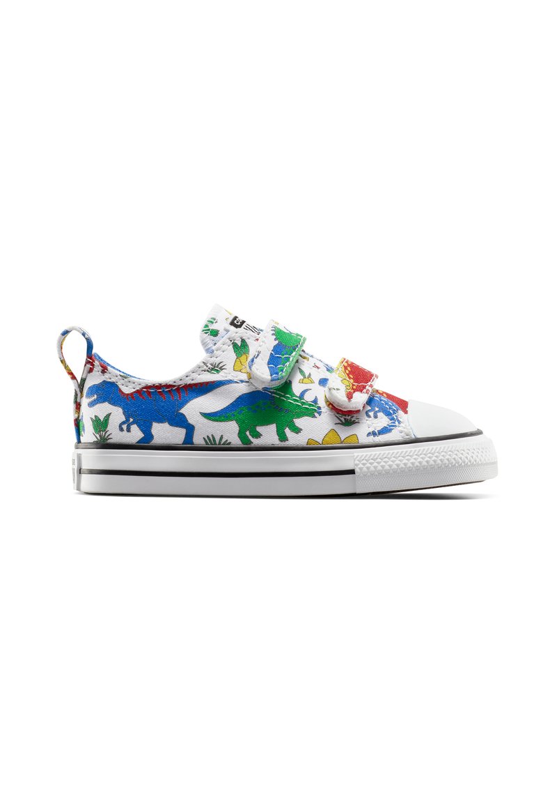 Sneakers con chiusura a strappo in tela bianca, decorate con colorati disegni di dinosauri nei toni del blu, verde e rosso, una punta in gomma e strisce nere.