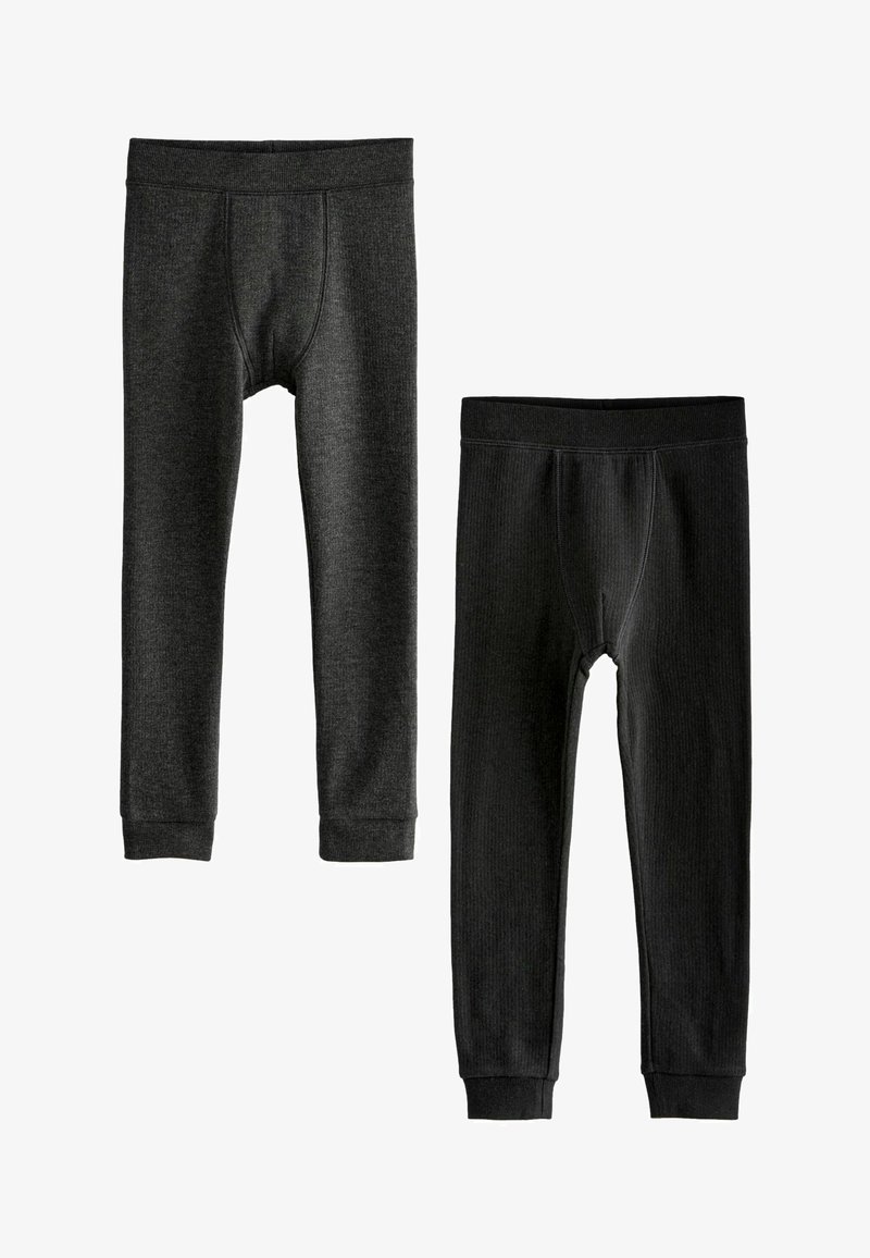 Divas divas termoregulācijas bikses tumšās krāsās. Vienām ir ribota tekstūra; abām ir elastīgas jostas un pieguļoši aproces pie potītēm.