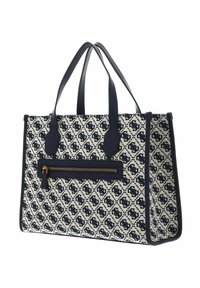 Torebka typu tote w kolorach granatowym i kremowym, z wzorem, podwójnymi uchwytami, teksturowanym materiałem oraz przednią kieszenią na zamek z złotymi akcentami. Prostokątny kształt.