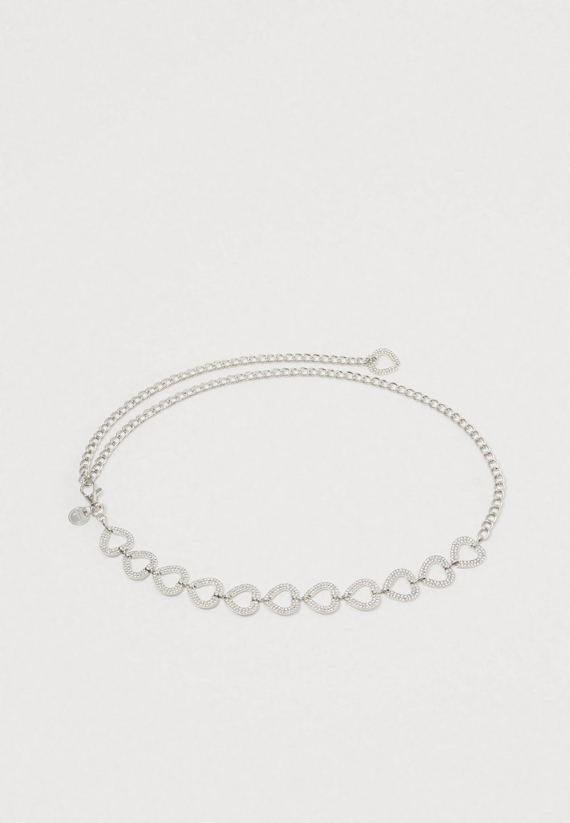 Hõbedane käevõru, mis koosneb omavahel ühendatud südamekujulistest linkidest, millel on tekstuuriga detailing ja lukuga sulgemine. Topeltoksaga disain.