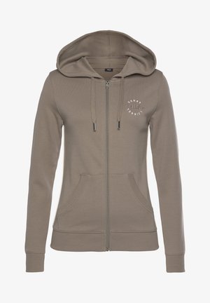 Kapuzensweatshirt mit Reißverschluss in einem gedämpften Taupe-Ton. Verfügt über zwei Taschen vorne, gerippte Bündchen und ein rundes Logo auf der linken Brust.