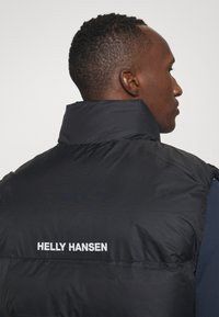 Helly Hansen ACTIVE PUFFY - Strukirani kaput - black