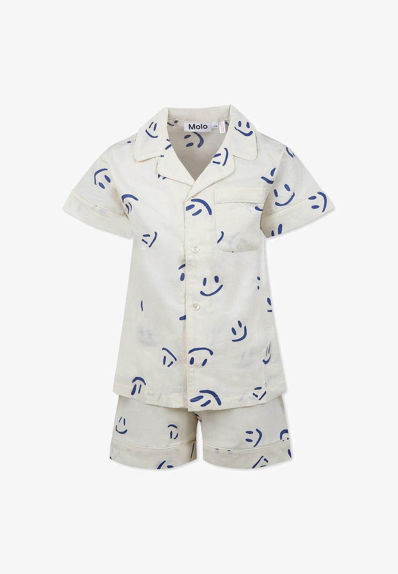 Kortärmad pyjamasuppsättning med krage i ljus gräddig tyg med blått leende ansikte-mönster, knäppning med knappar och kontrasterande kant.
