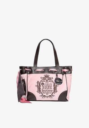 Pink fabric tote bag with dark brown leather accents. Features an ornate printed design and a decorative charm. Dual shoulder straps.
