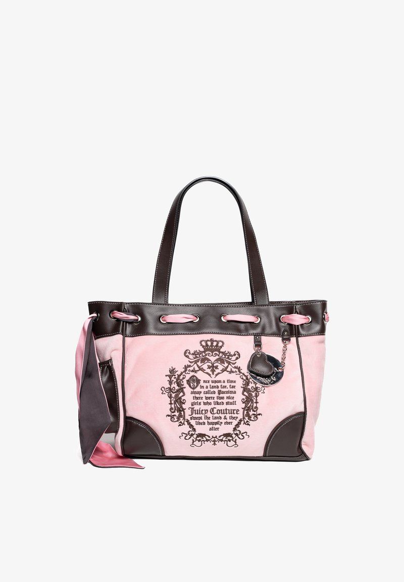 Pink fabric tote bag with dark brown leather accents. Features an ornate printed design and a decorative charm. Dual shoulder straps.